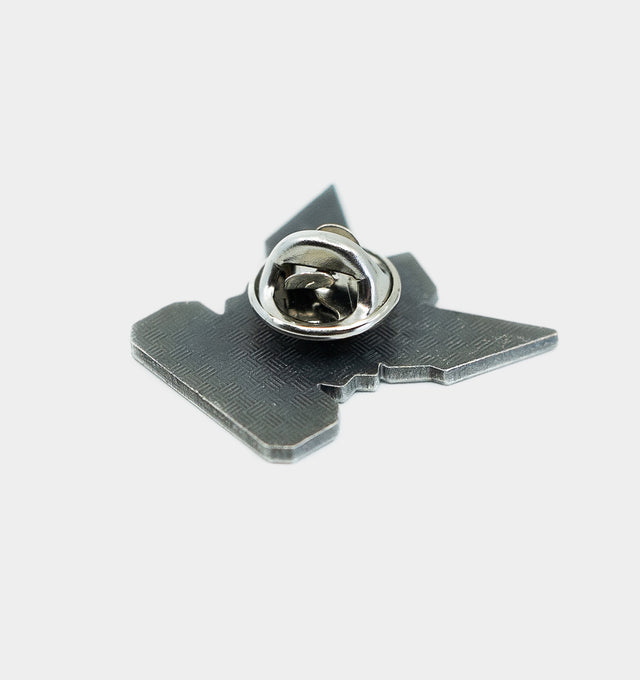 SYMBOL METAL BADGE