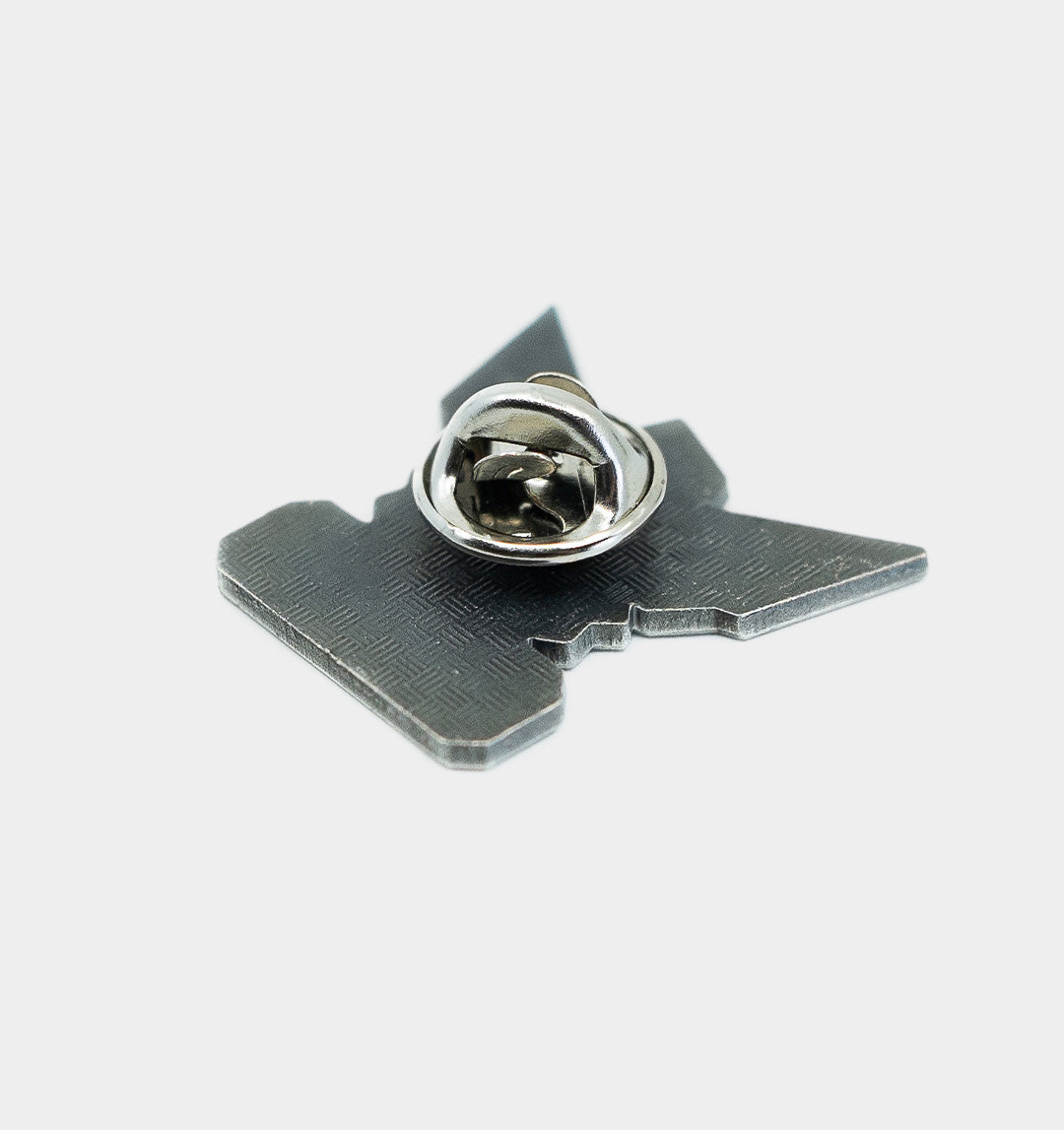 Symbol Metal Badge